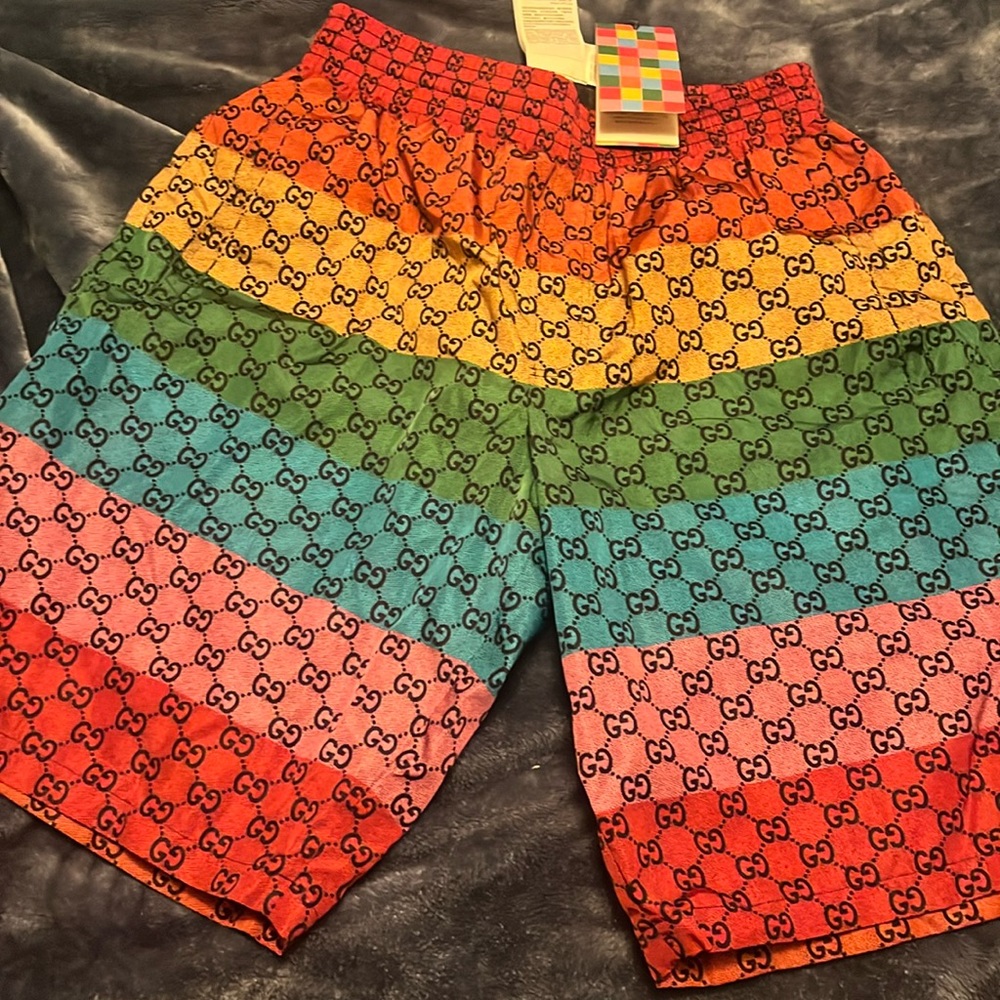 NWT Multicouloured GG psychedelic swim trunks.